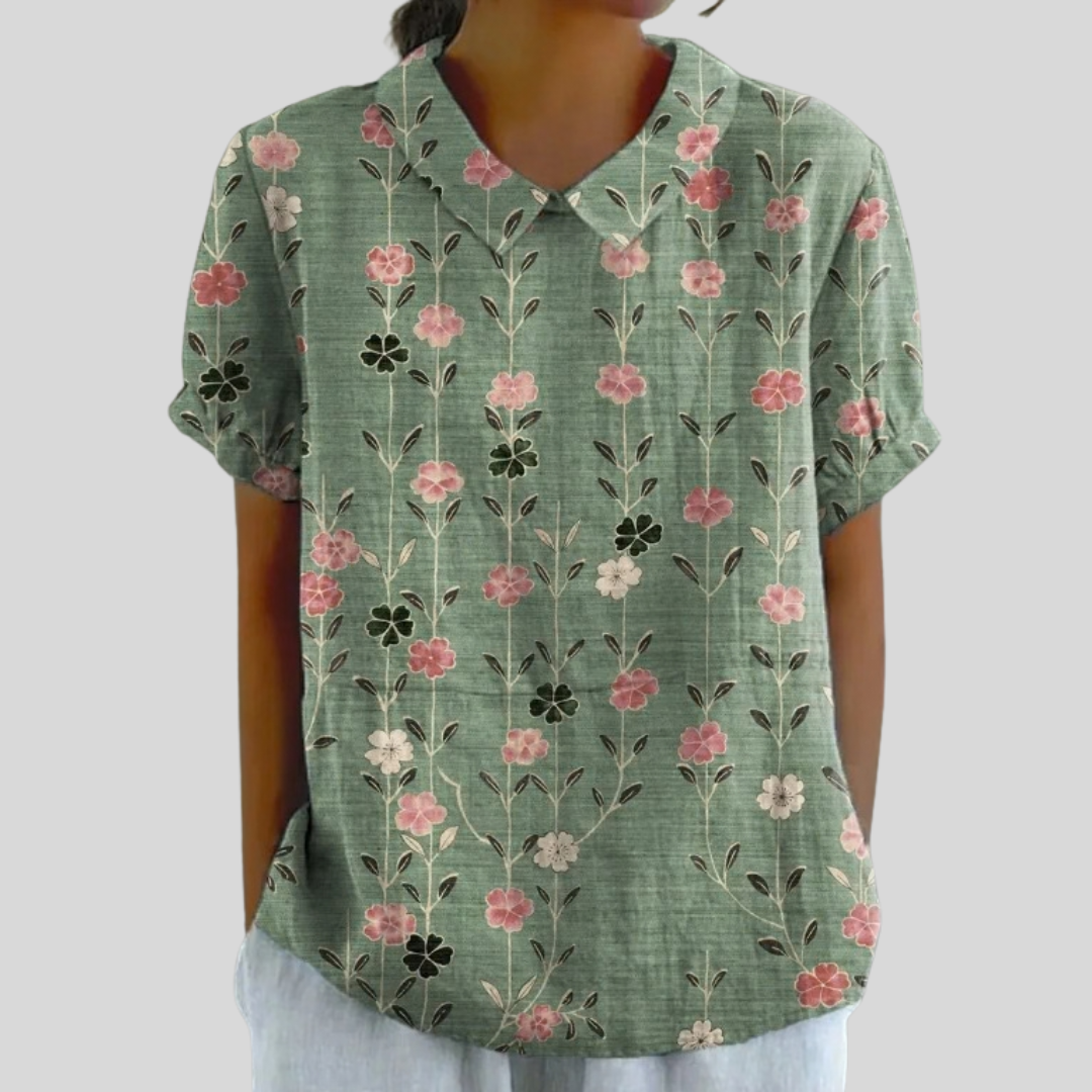 Blouse florale verticale Amandine de Danoir Paris, tissu léger avec motifs floraux colorés, manches longues et col en V.