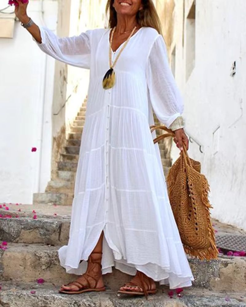 Robe d'été espagnole Solara de Danoir Paris, tissus légers avec motifs colorés, manches courtes et coupe fluide.