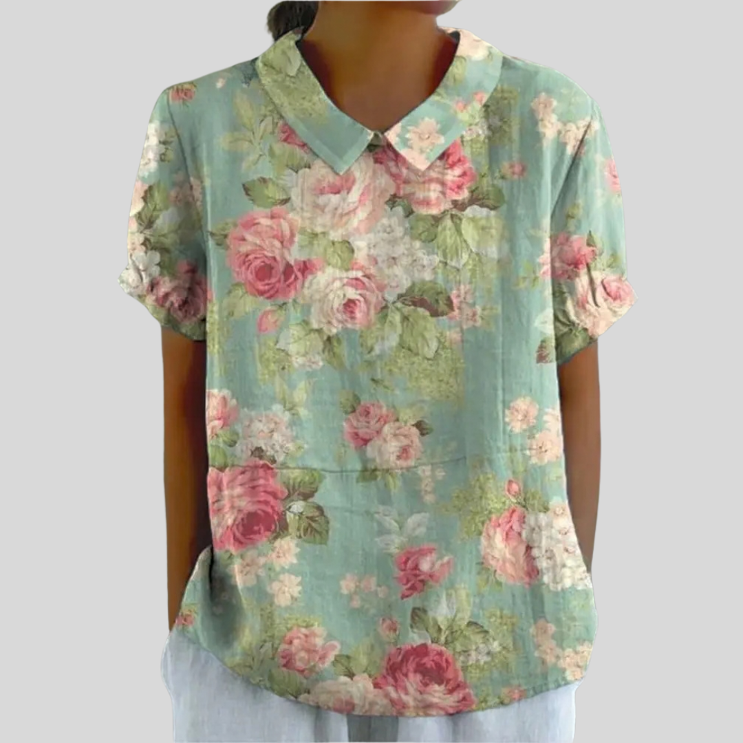 Blouse florale vintage Brigitte de Danoir Paris, motif floral coloré, manches longues, style élégant et féminin.