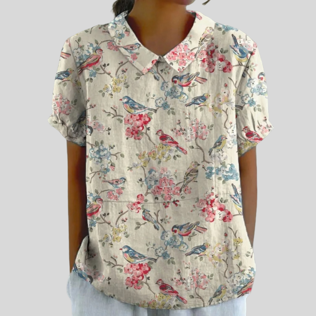 Blouse imprimée oiseaux et fleurs Clémence de Danoir Paris, tissu léger, motif coloré, manches longues, style élégant et féminin.