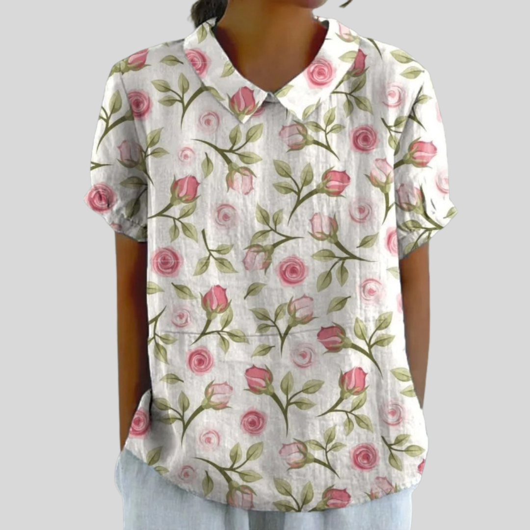 Blouse Élodie Danoir Paris à fleurs roses délicates, tissu léger et élégant, vue de face sur mannequin.
