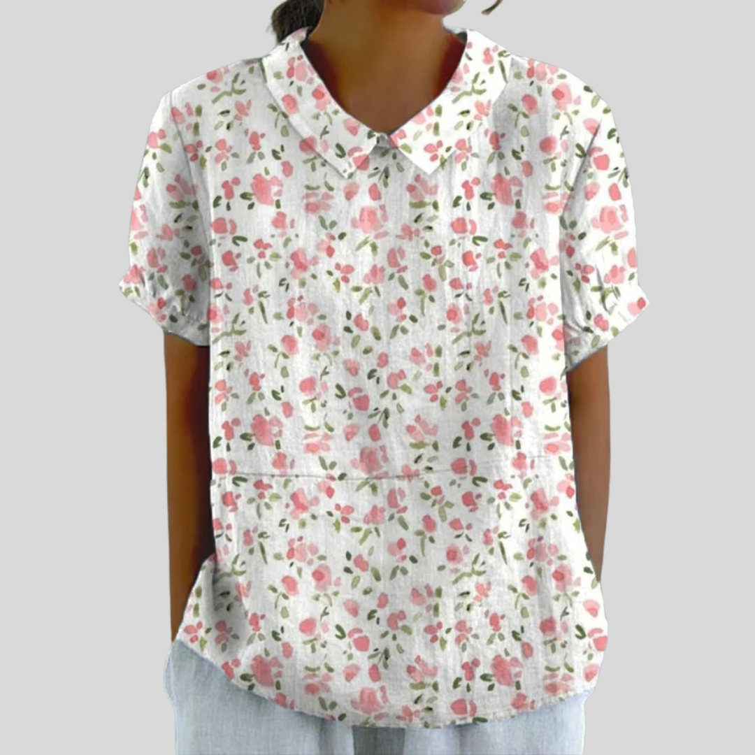 Blouse Juliette de Danoir Paris avec motifs de petites fleurs, manches longues et coupe élégante, tissu léger en coton.