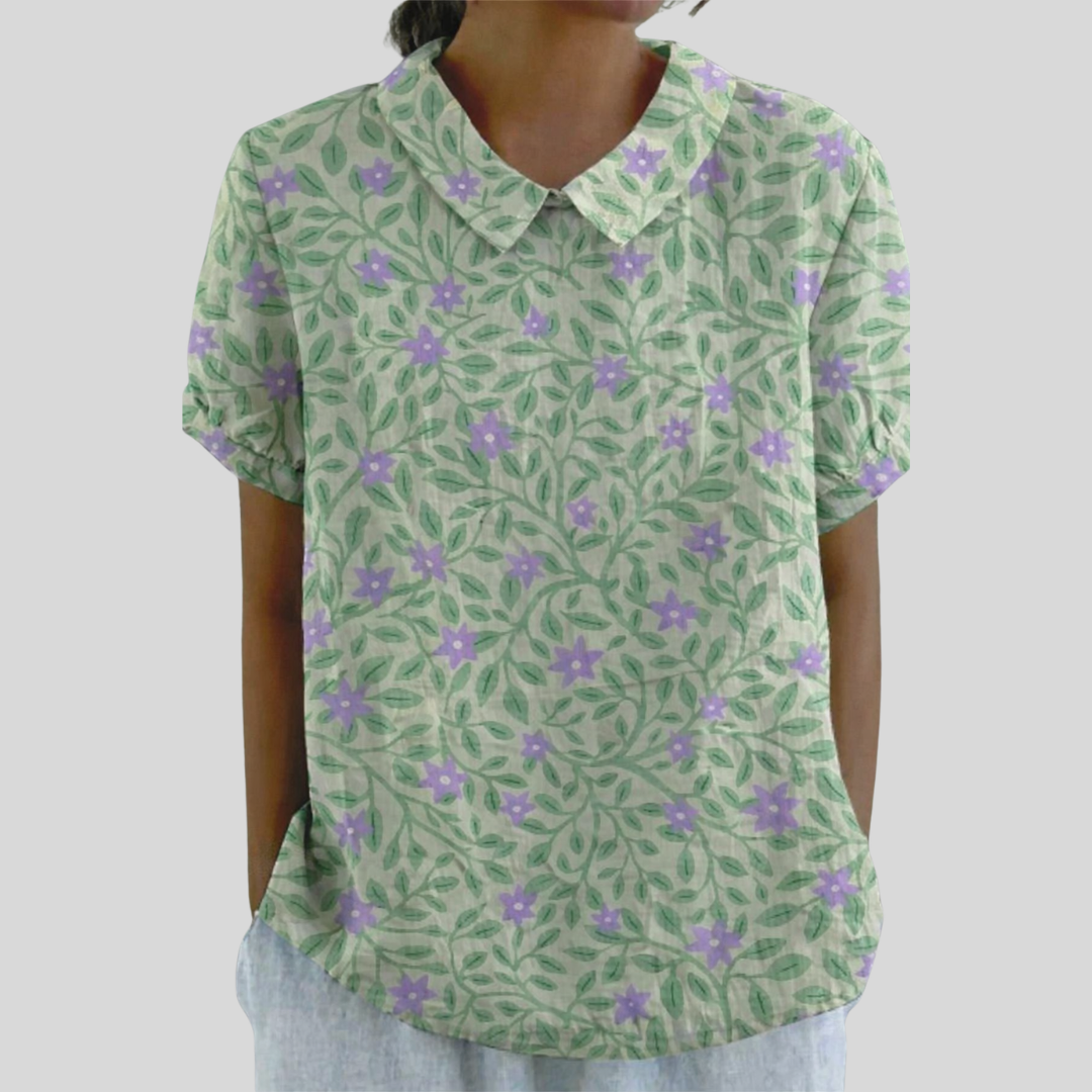 Blouse Danoir Paris Lucienne avec motif feuillage fleuri, tissu léger, manches longues, style élégant et féminin.