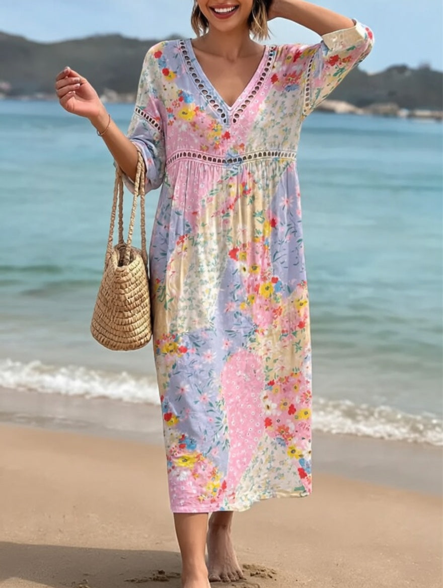 Robe fluide florale Lysiane™ de Danoir Paris, style estival, avec motifs floraux colorés et coupe légère pour femme.