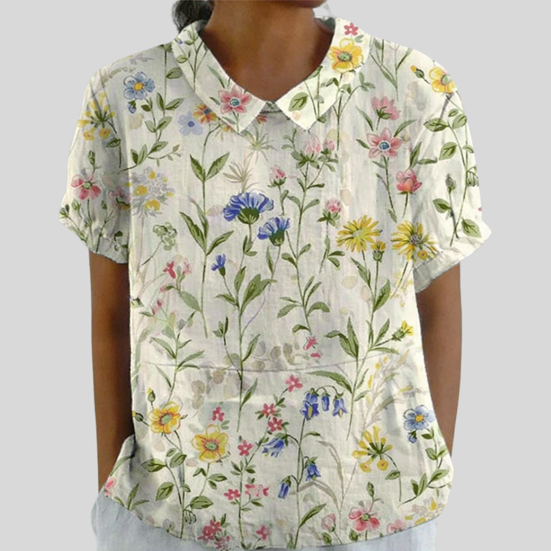 Blouse mélodie de Danoir Paris avec motifs fleurs champêtres, tissu léger et coupe féminine, vue de face.