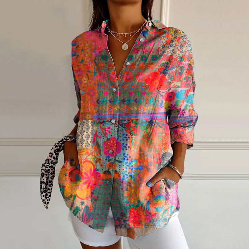 Blouse vintage élégante Danoir Paris, coupe fluide, col en V, manches longues en tissu léger, portée décontractée.
