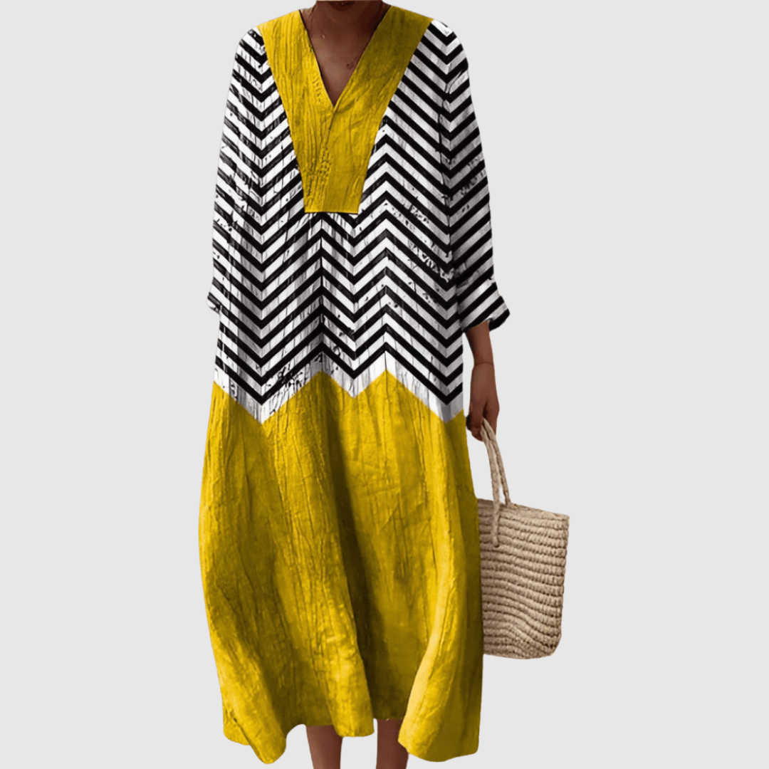 Robe Mélodie Tessa™ de Danoir Paris, en tissu léger avec motifs floraux, portée sur mannequin.