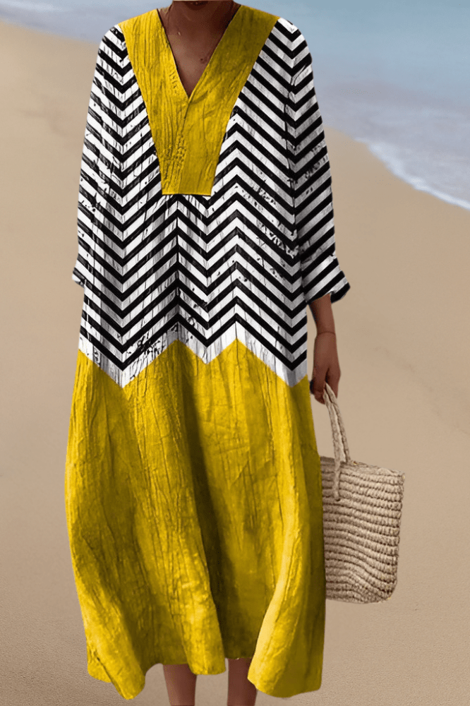 Robe Mélodie Tessa™ de Danoir Paris, en tissu léger avec détails élégants, portée par une mannequin.