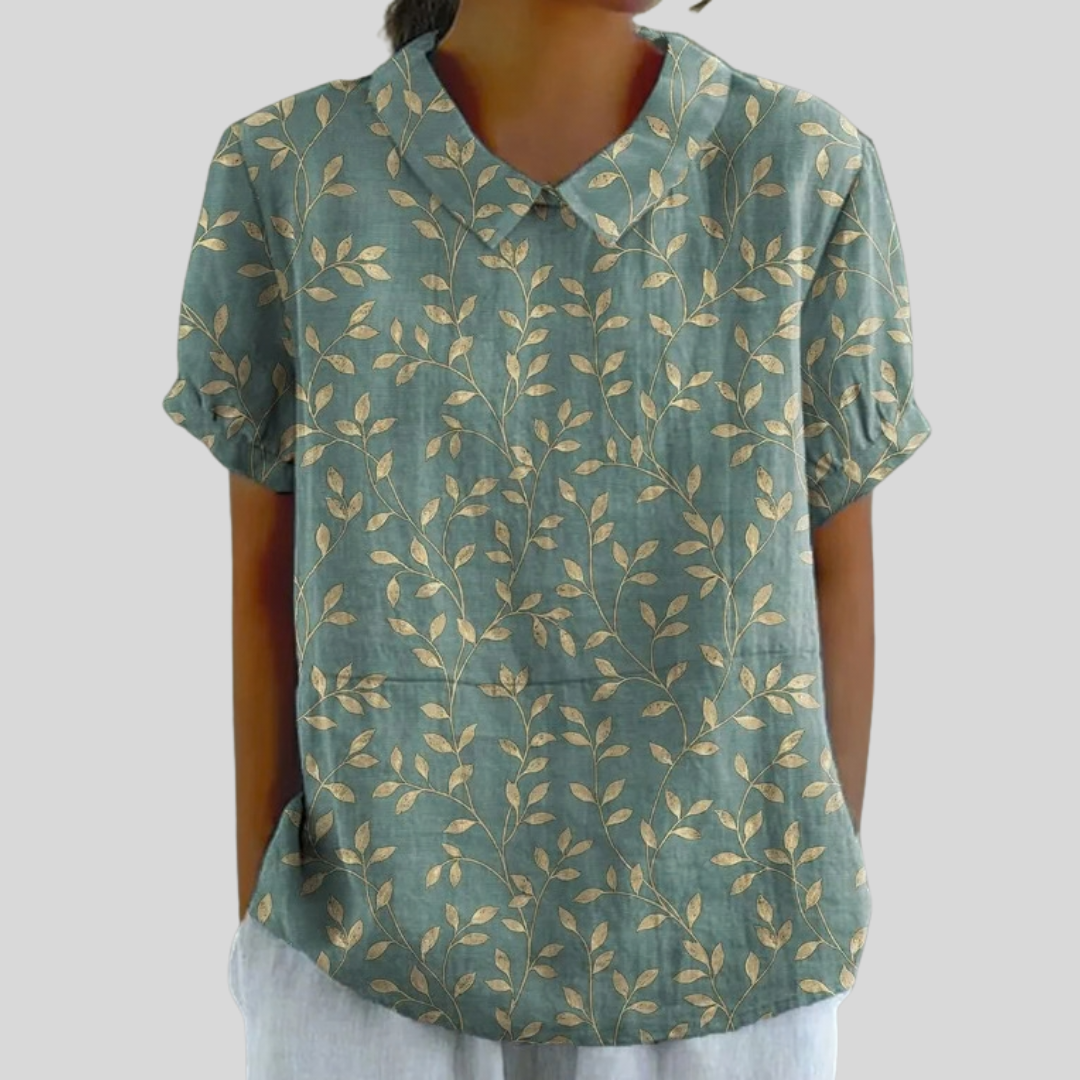 Blouse feuillage élégante Valentine de Danoir Paris, tissu léger avec motif feuillage, manche longue et coupe féminine.