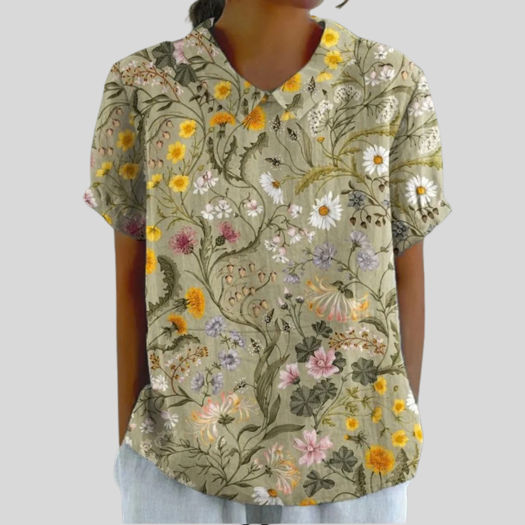 Blouse jardin champêtre Victoire de Danoir Paris avec motifs floraux, manches longues et coupe élégante.