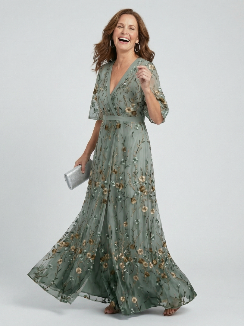 Robe longue halter Bloom Flow de Danoir Paris, maxi dress avec motif floral et décolleté élégant, en tissu léger et fluide.