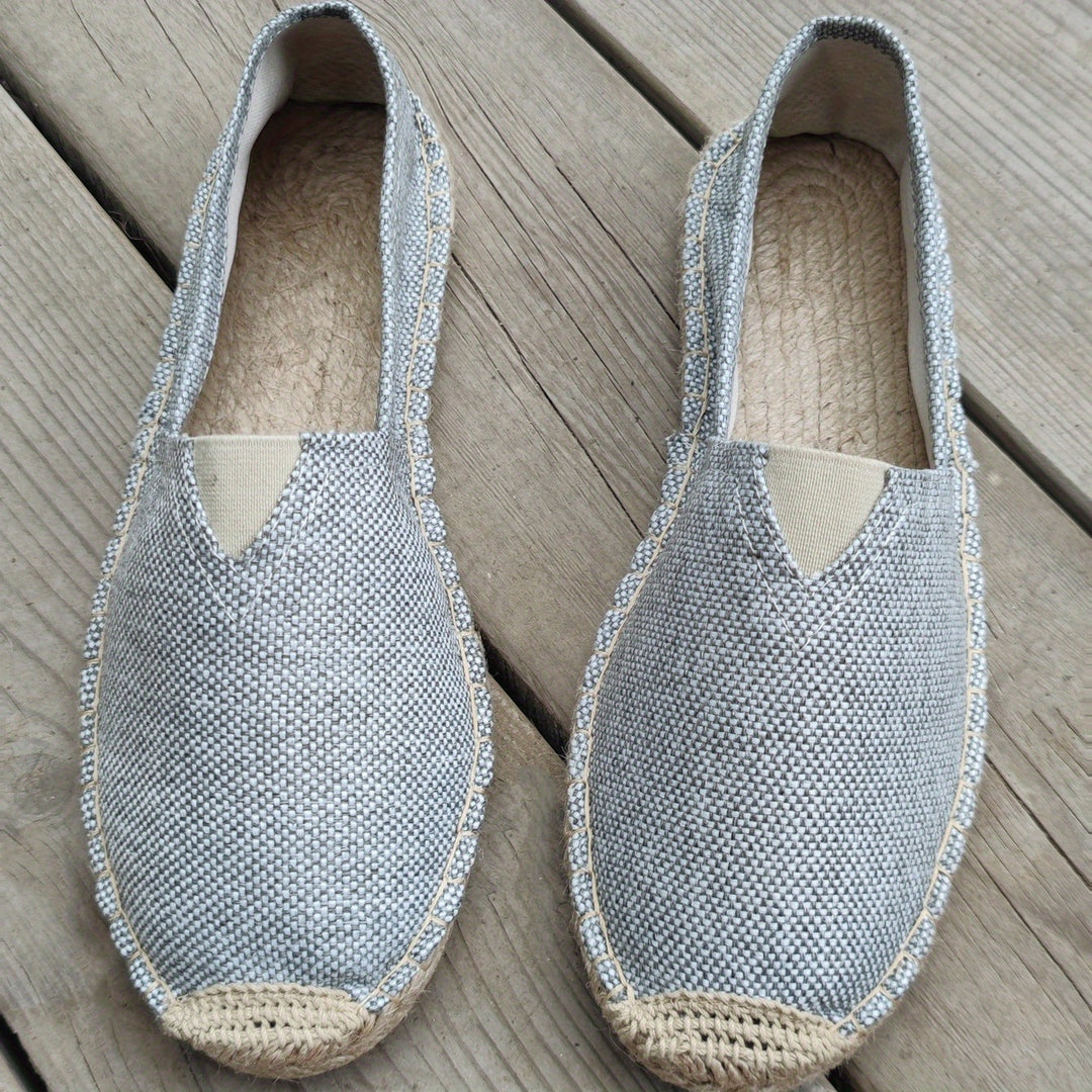 Espadrilles élégantes pour hommes de la marque Danoir Paris, chaussures blanches en toile et semelle en corde.