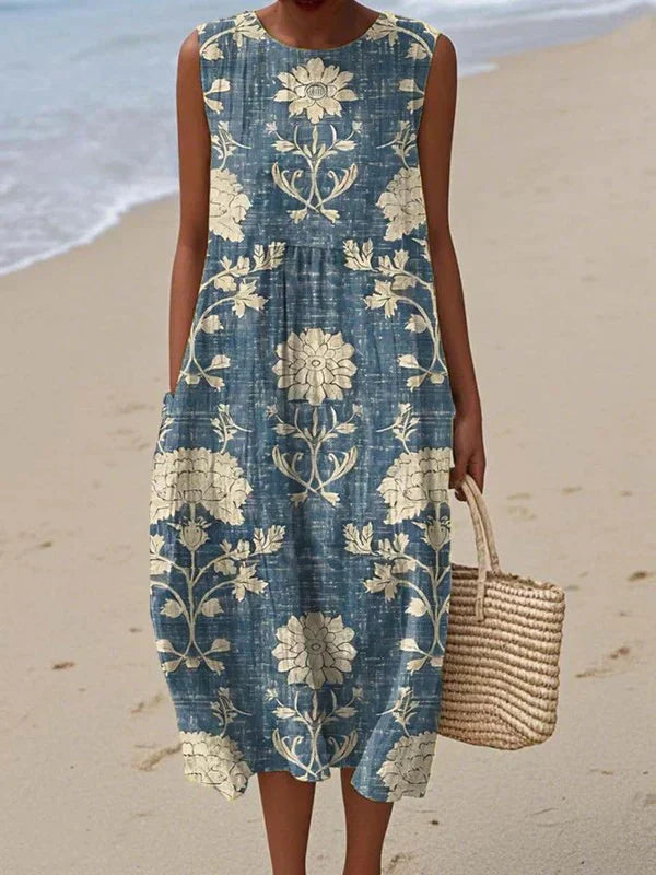 Robe midi sans manches Charlotte de Danoir Paris, vêtement confortable en tissu léger, portée avec un style décontracté.
