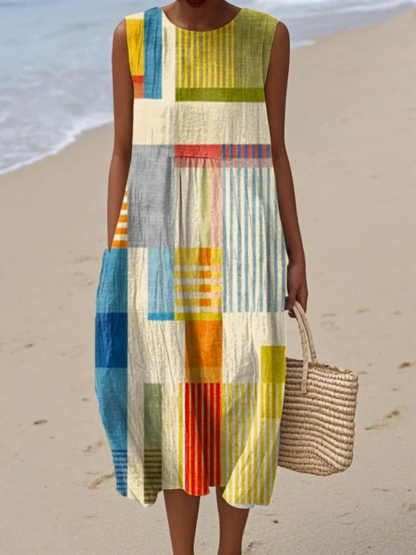 Robe midi sans manches Eve de Danoir Paris avec motif géométrique, tissu fluide et coupe élégante.