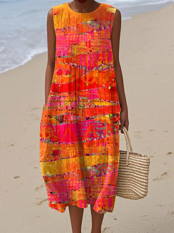 Robe midi sans manches Faye de Danoir Paris, motif coucher de soleil, tissu fluide et élégant, portée décontractée ou habillée.