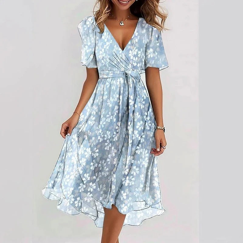 Robe florale élégante Yara de Danoir Paris, tissu fluide avec imprimé floral, longueur midi, style chic et féminin.
