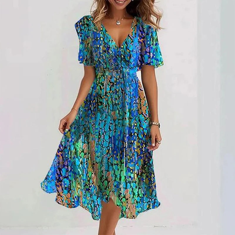 Robe florale élégante Danoir Paris, coupe fluide avec motifs floraux colorés, tissu léger et chic pour femme.