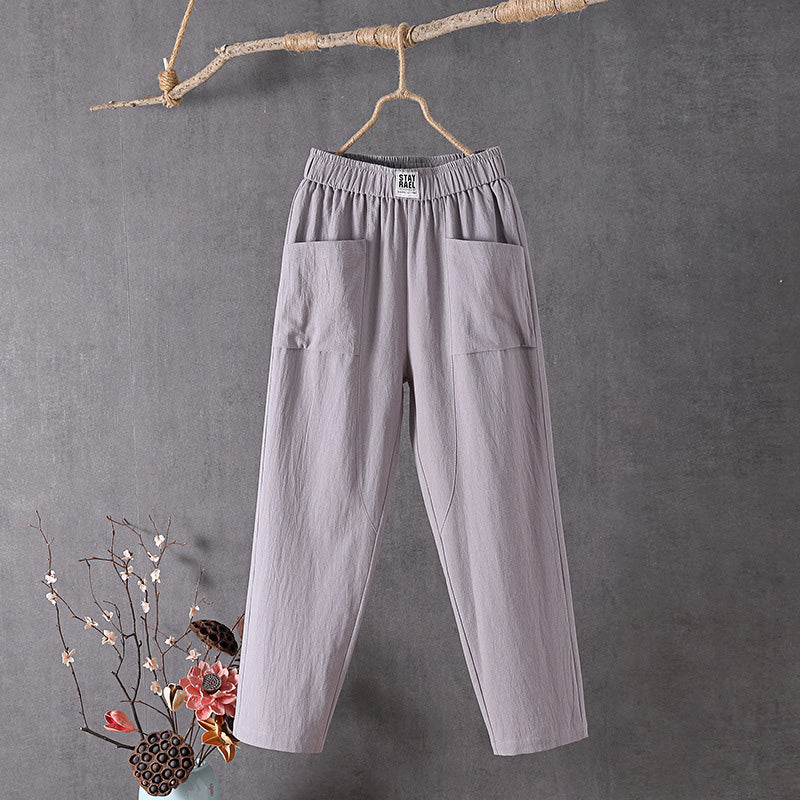 Pantalons relaxés Danoir Paris Alyra avec poches, tissu doux et confortable, vue frontale sur le pantalon beige.