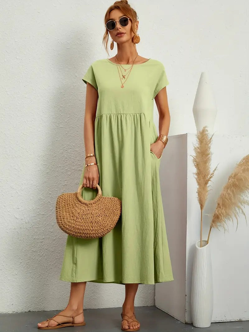 Robe douce et élégante Jeane de Danoir Paris, en tissu vert avec coupe fluide et détails raffinés.