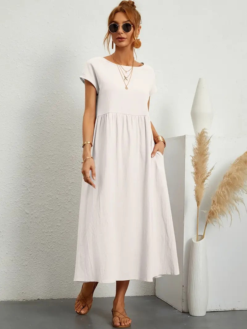 Robe élégante Danoir Paris Jeane en tissu doux vert, vue de face avec détails de la robe et coupe fluide.