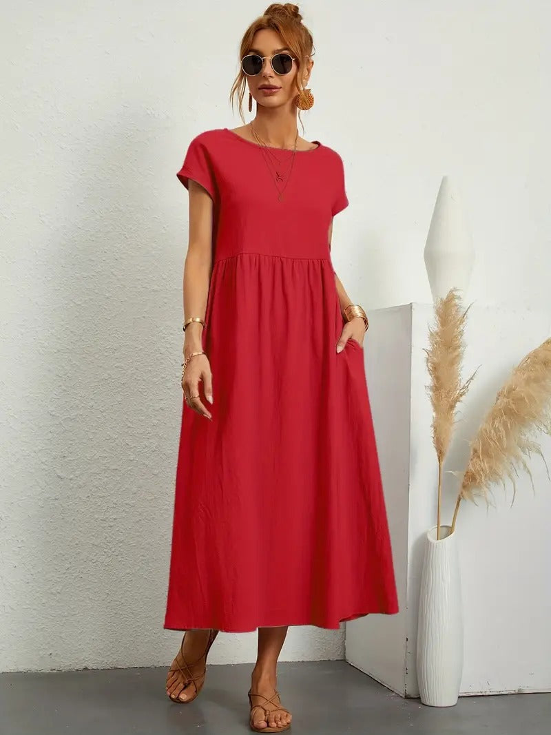 Robe douce et élégante Jeane de Danoir Paris en tissu vert, vue de face, mettant en valeur le design raffiné.
