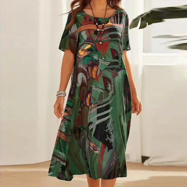 Tunique décontractée Jodilyn de Danoir Paris, style bohème, manches courtes, longueur mi-mollet, imprimé artistique, look d'été.