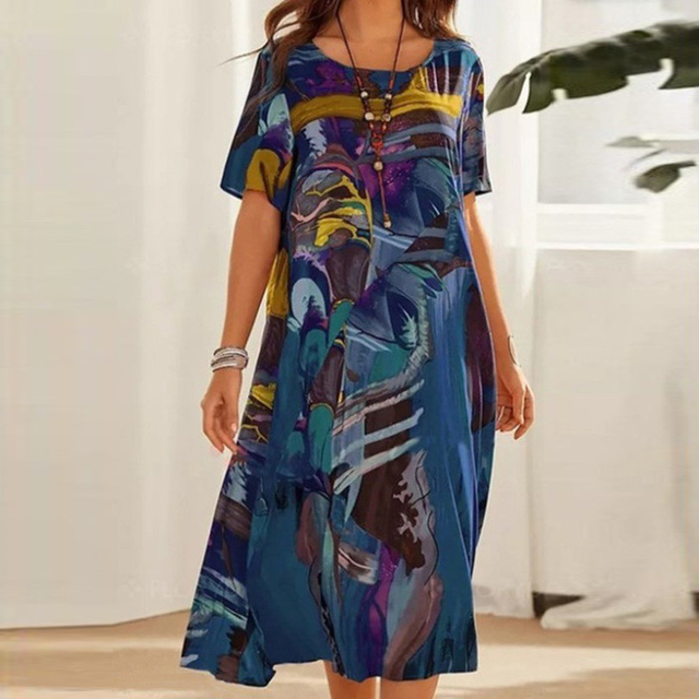 Tunique décontractée Jodilyn de Danoir Paris pour femmes, manches courtes, coupe midi, imprimé artistique et style bohème.