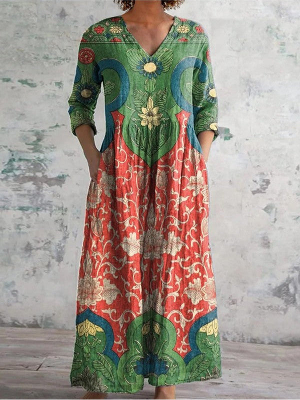 Robe maxi florale élégante Judith de Danoir Paris, tissu fluide avec motif floral coloré, portée longue et sophistiquée.