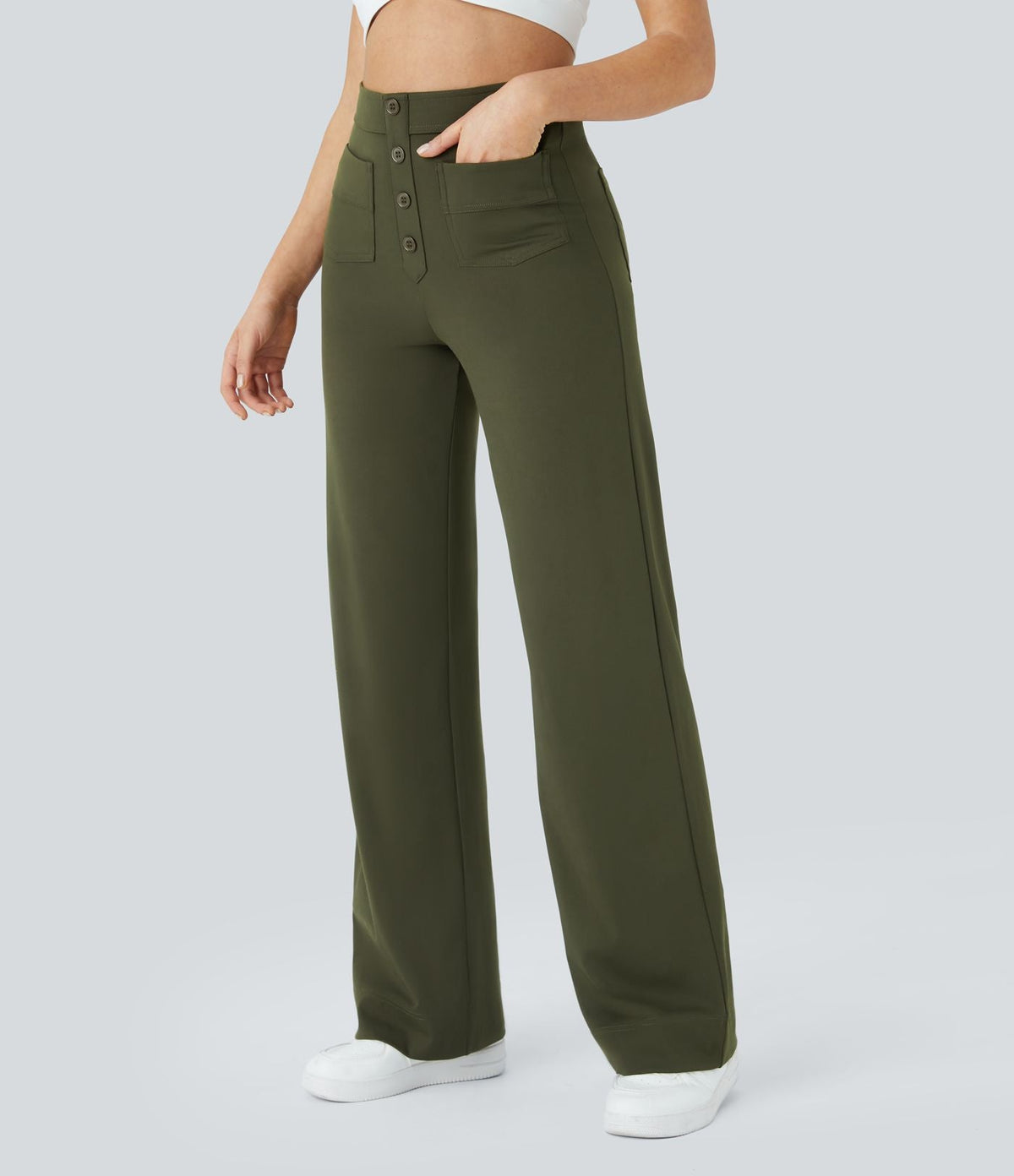 Pantalons élastiques Jade de Danoir Paris en vert, confortables et ajustés, vus en gros plan sur fond neutre.