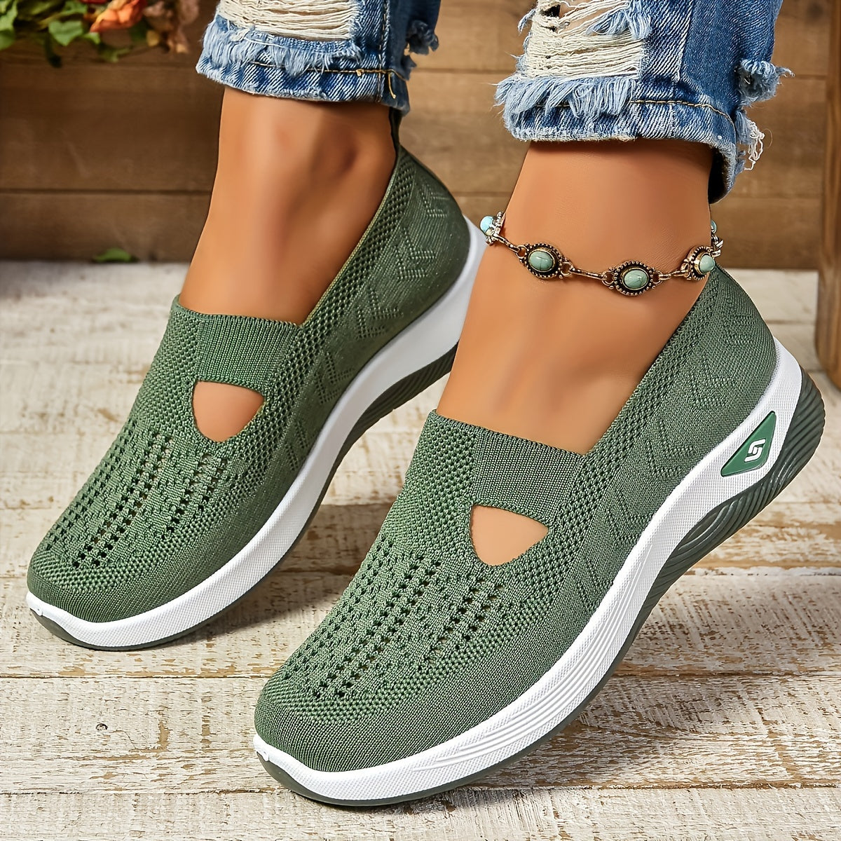 Chaussures antidérapantes Danoir Paris avec semelles offertes, en cuir noir et design confortable, vues de côté.