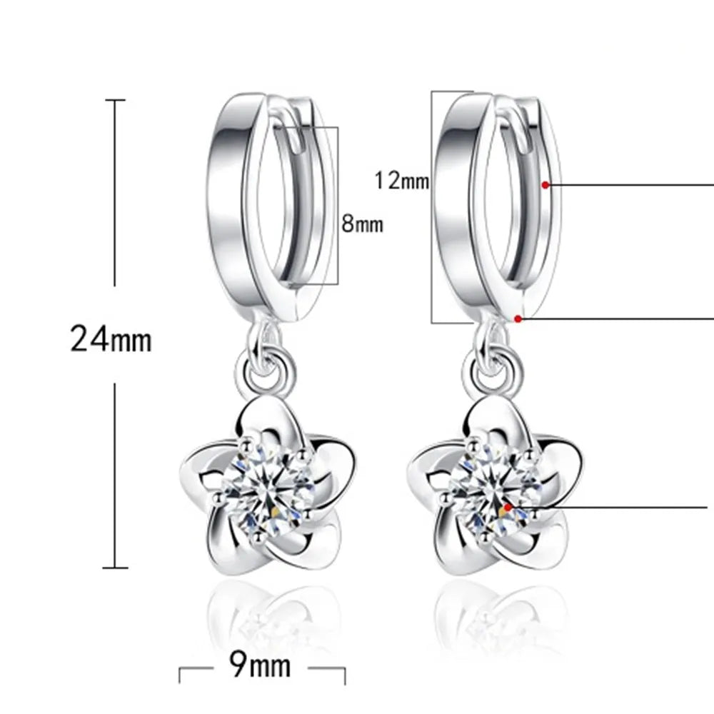 Boucles d'oreilles en argent sterling avec zircons violets et blancs, bijoux élégants de Danoir Paris.