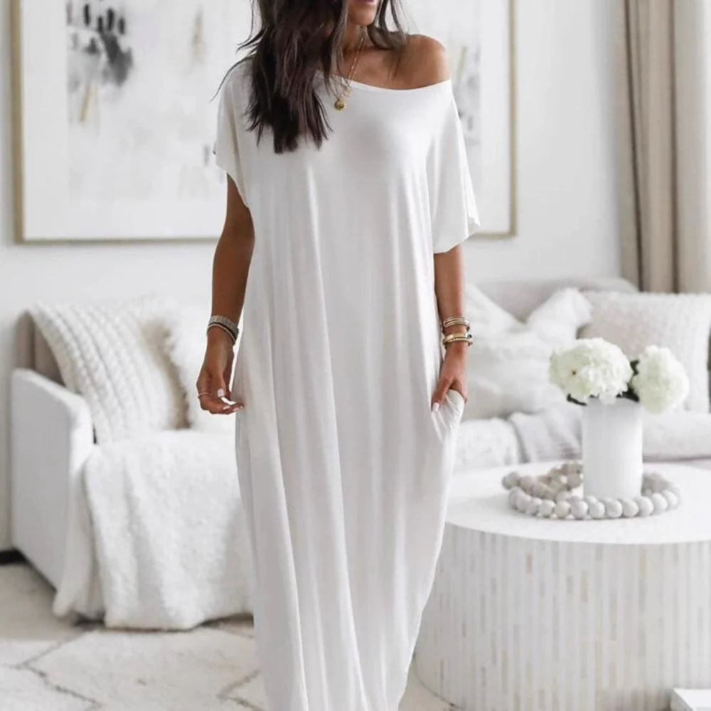 Robe décontractée oversize asymétrique à épaules dénudées Danoir Paris, tissu léger et style moderne.