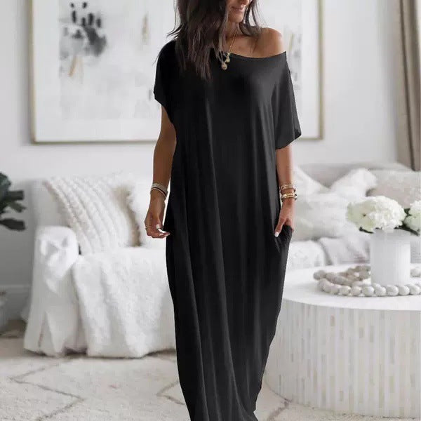 Robe décontractée oversize asymétrique avec épaules dénudées, marque Danoir Paris, tissu léger et style tendance.