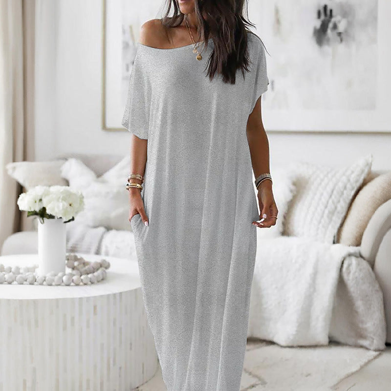 Robe décontractée oversize asymétrique à épaules dénudées Danoir Paris, tissu fluide et style élégant.