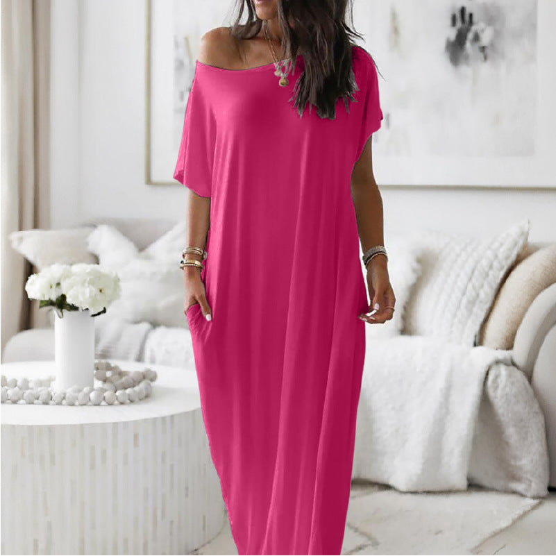 Robe décontractée oversize asymétrique à épaules dénudées de Danoir Paris, tissu léger et style décontracté.