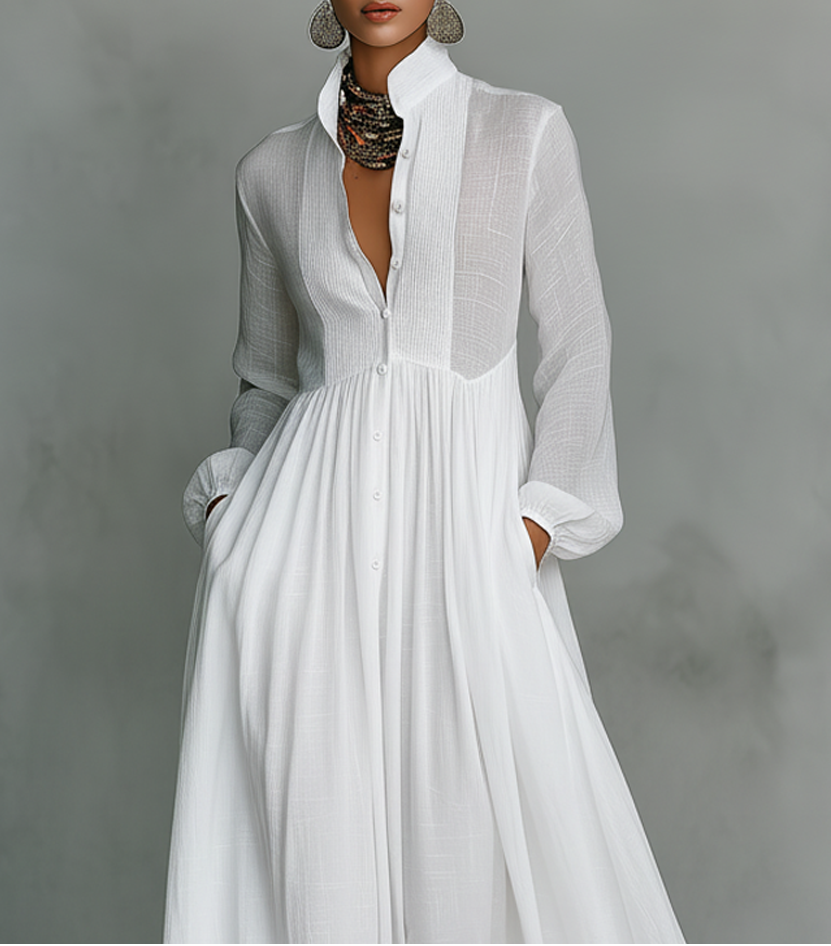 Robe longue fluide blanche Serena de Danoir Paris avec boutons sur le devant, vêtement élégant pour femmes.