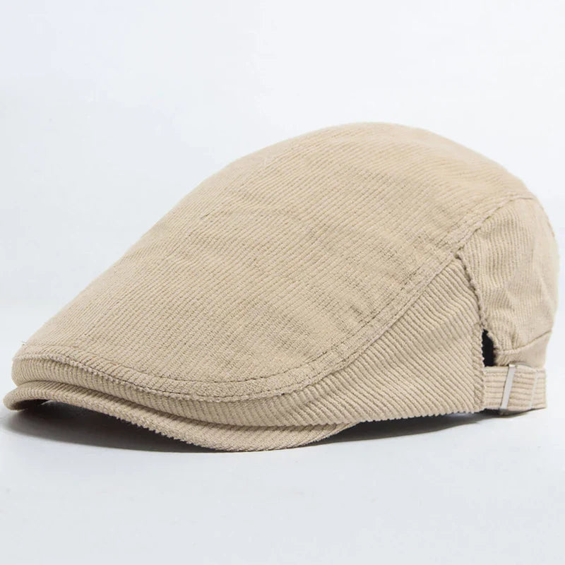 Chien homme portant un manteau en velours côtelé rouge Bloom™ de Danoir Paris, style élégant et chaud.