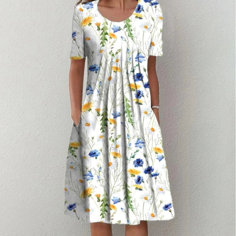 Robe midi aérée élégante pour femmes de la marque Danoir Paris, tissu fluide et silhouette raffinée.