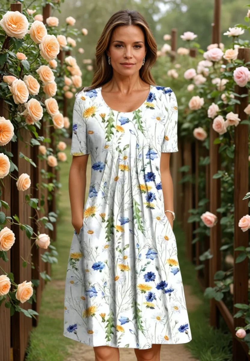 Robe midi élégante pour femmes Danoir Paris, tissu léger et fluide, silhouette sophistiquée, portée idéale pour une occasion spéciale.