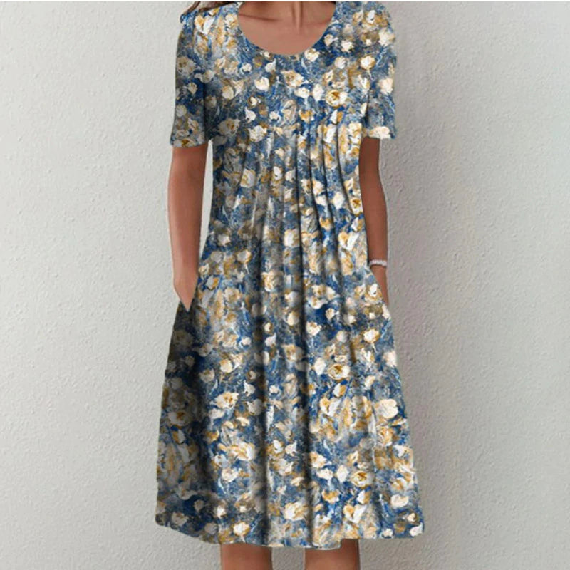 Robe midi élégante et aérée pour femme, de la marque Danoir Paris, avec tissu fluide et style sophistiqué.
