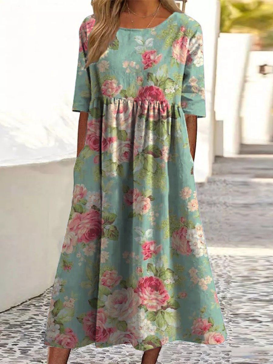 Robe midi décontractée pour femmes LAARNI™ de Danoir Paris, tissu fluide et coupe élégante, portée avec accessoires élégants.