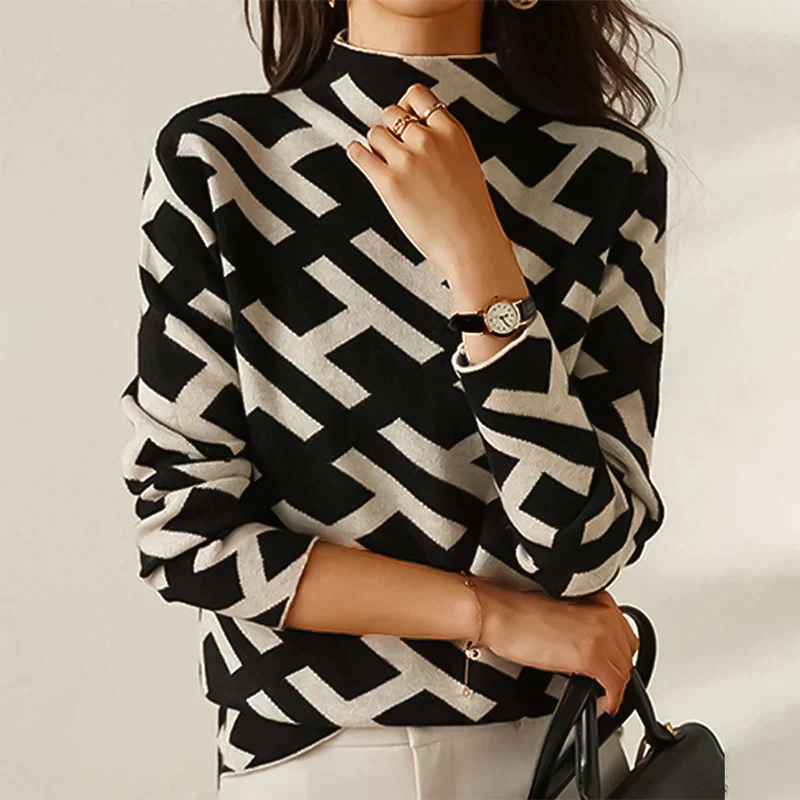 Pull doux et élégant Eloise de Danoir Paris, en maille confortable, couleur neutre, porté sur un mannequin.