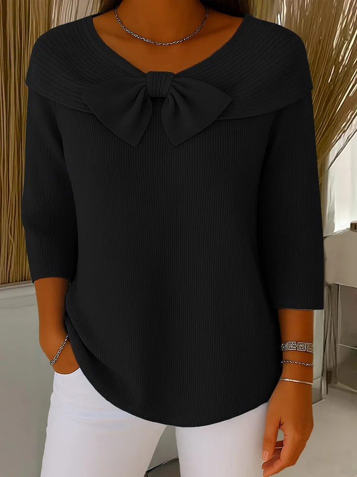 Pull élégant Neeko de Danoir Paris, en laine douce, porté par un mannequin, couleur beige, style chic et moderne.