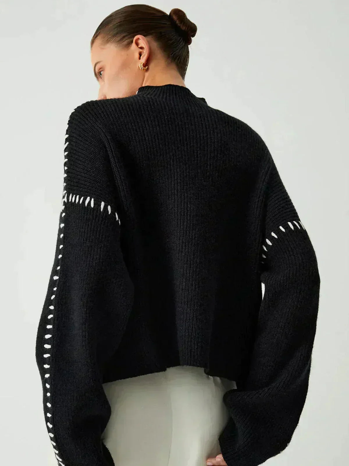 Pull en laine côtelée Danoir Paris Nia, confortable à col roulé avec surpiqûres, parfait pour l'automne, couleur noire.