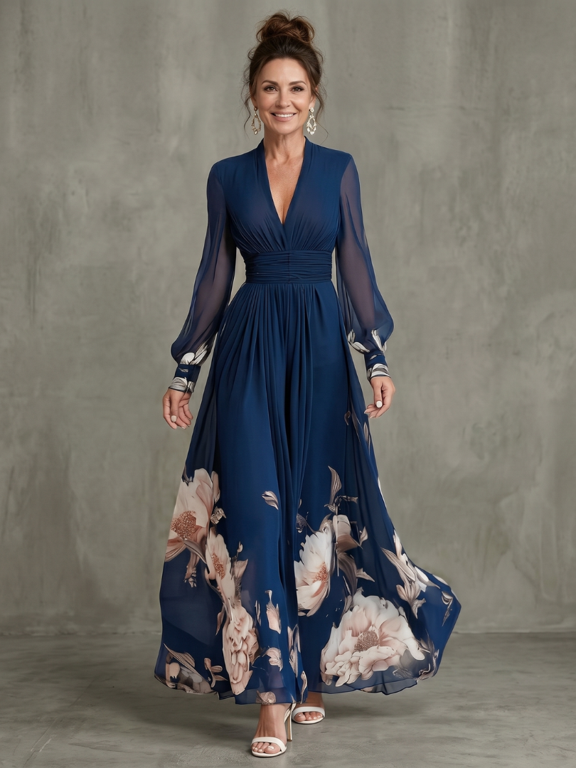 Robe maxi Danoir Paris à manches transparentes et ourlet floral, vue de face, tissu fluide et détail élégant.