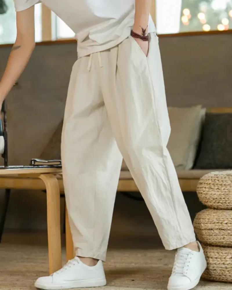 Pantalon en coton Cancun Old Money, coupe décontractée avec ceinture, couleur beige clair, idéal pour un style confortable.