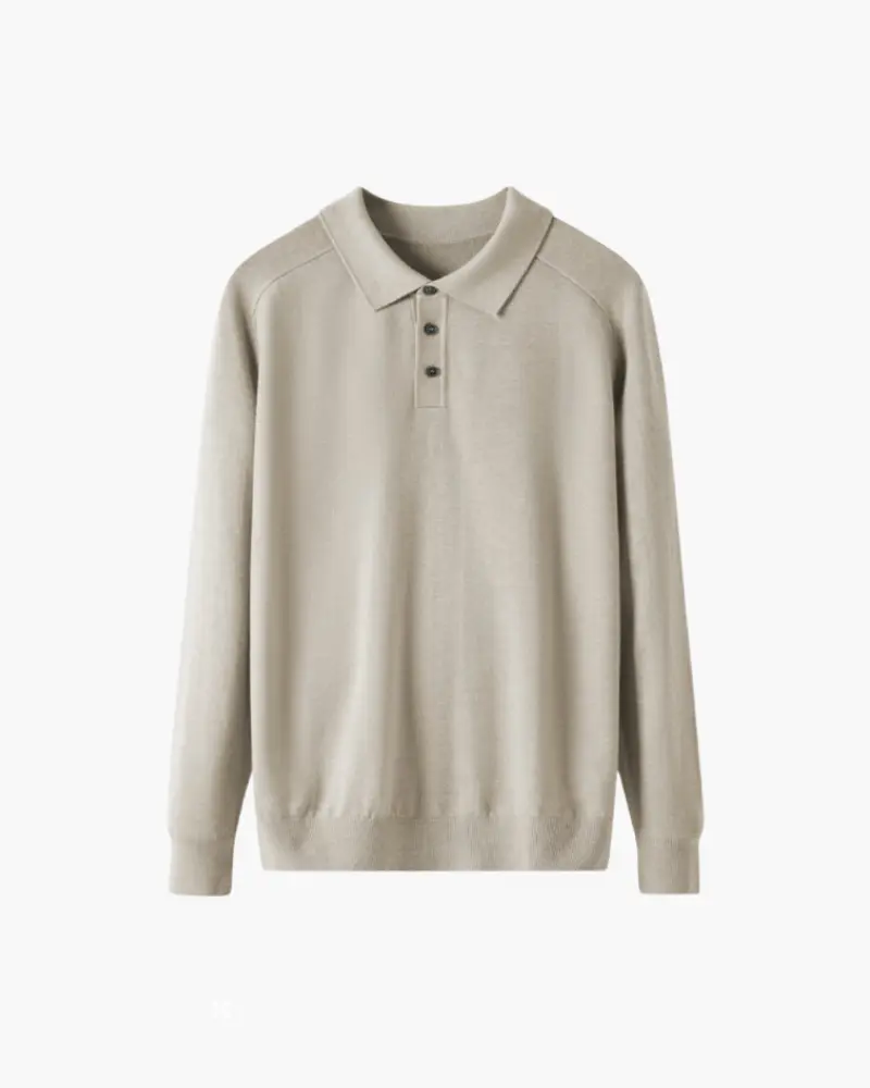 Pull en laine 100% de haute qualité de la marque Old Money, détail du col et texture douce visible sur l'image.