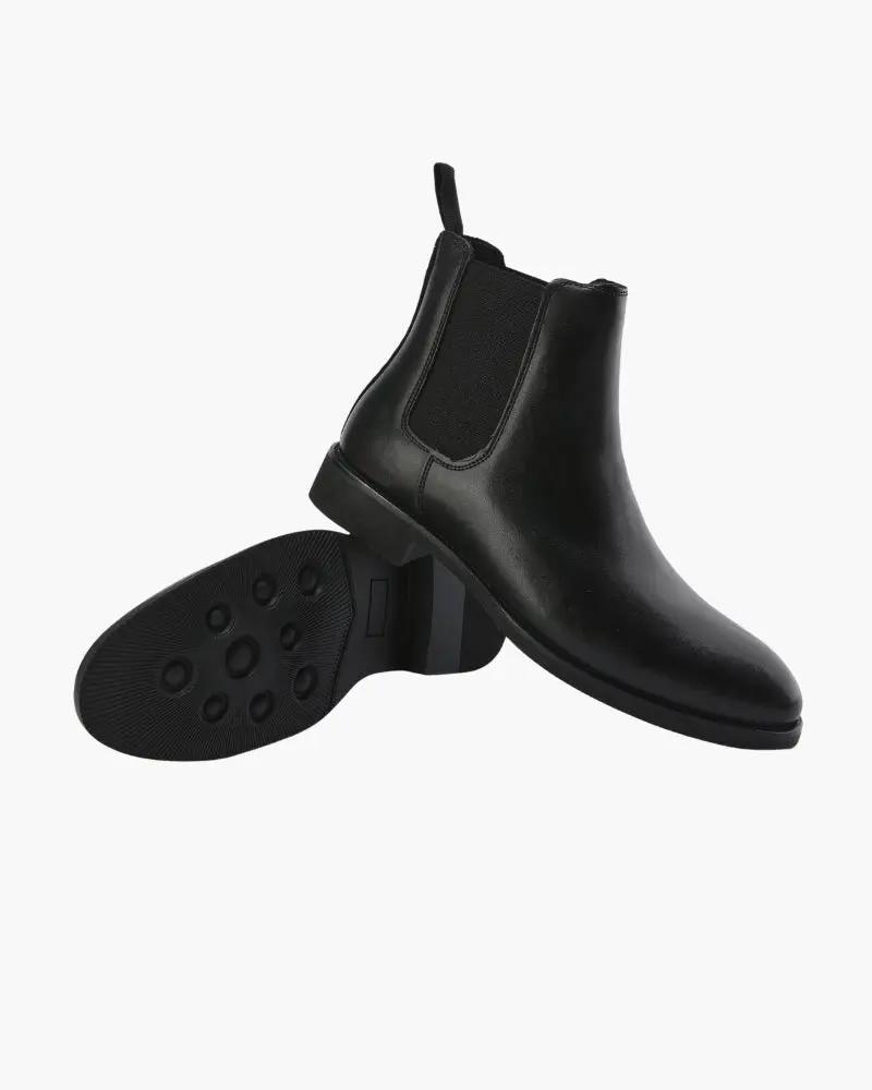 Bottes Chelsea Old Money en cuir marron avec semelle en caoutchouc, élégantes et classiques, vues de côté.