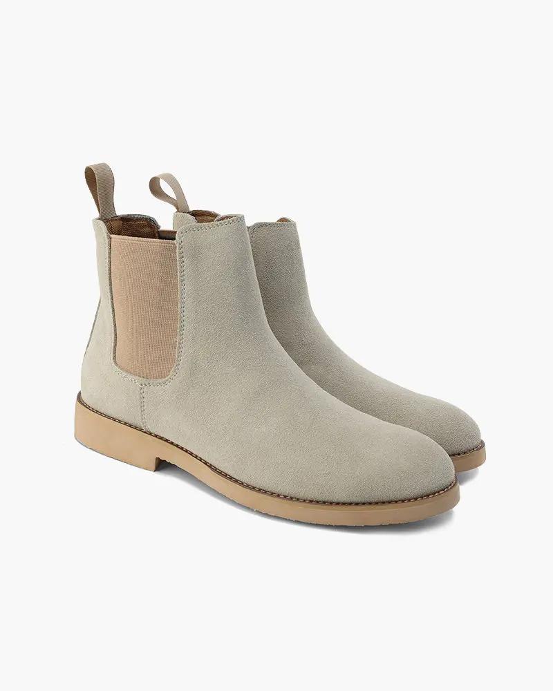 Bottes Chelsea Old Money en cuir marron foncé avec semelle en caoutchouc, style classique et élégance intemporelle.