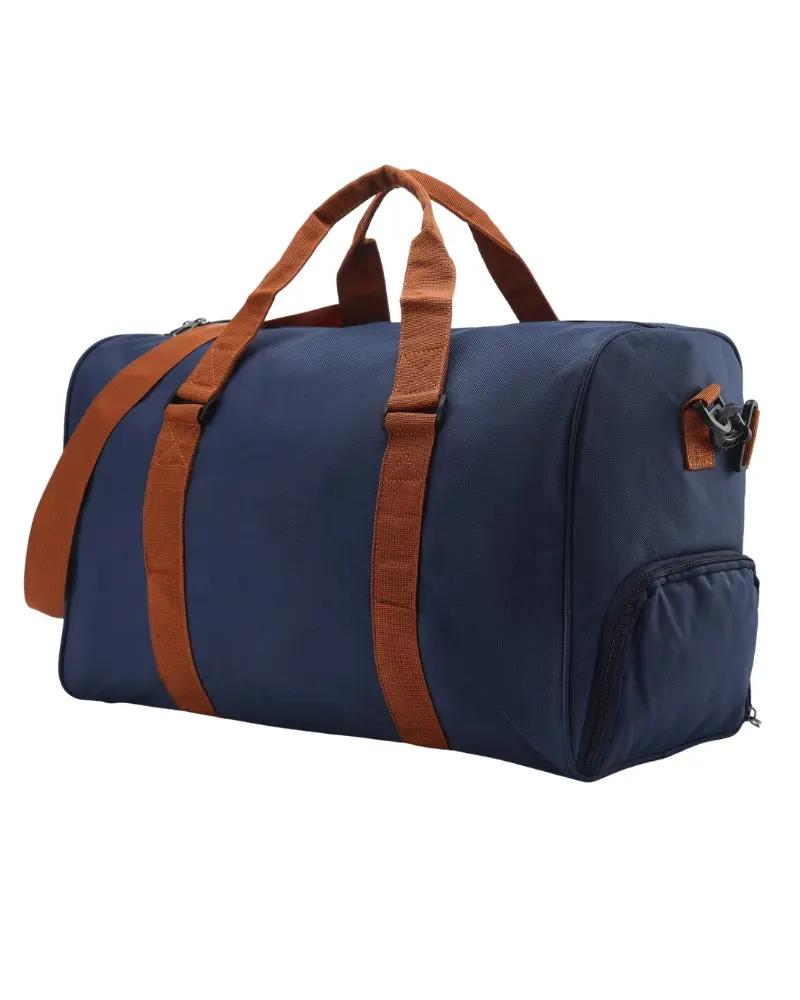 Sac de voyage Nova Duffle de la marque Old Money, en tissu noir avec poignées en cuir et fermeture éclair robuste.